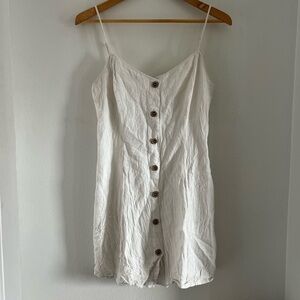 Garage white linen mini dress with a criss cross back, row of buttons on front